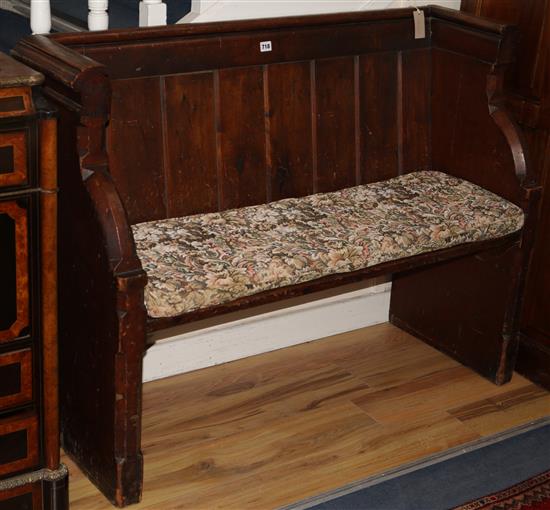 A Victorian pine pew, W.124cm